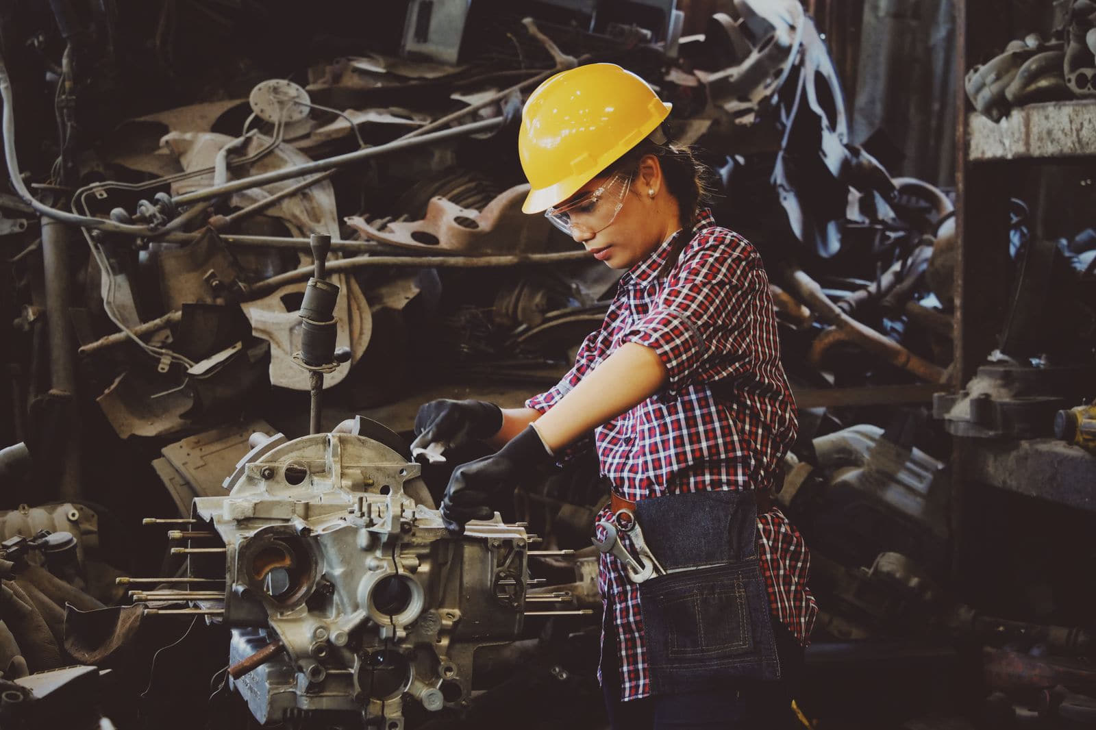 Technician servicing industrial plant equipment